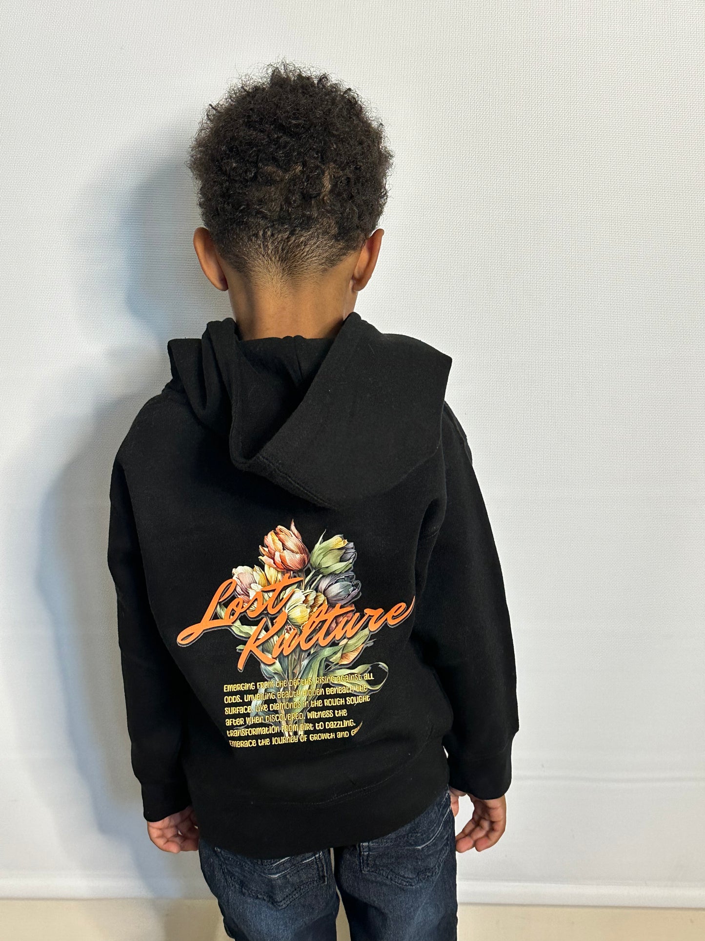 A boy wearing Lost Kulture Growth and Grace Youth Hoodie a product from lost kulture the best clothing store, best men clothing brands best clothing for men clothing stores online clothing